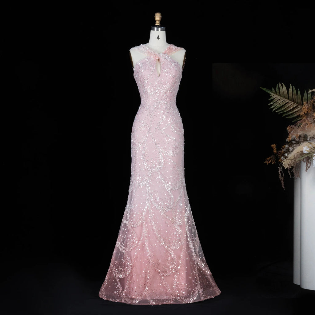 Robe de soirée trapèze perlée et croisée – CLEVI Paris
