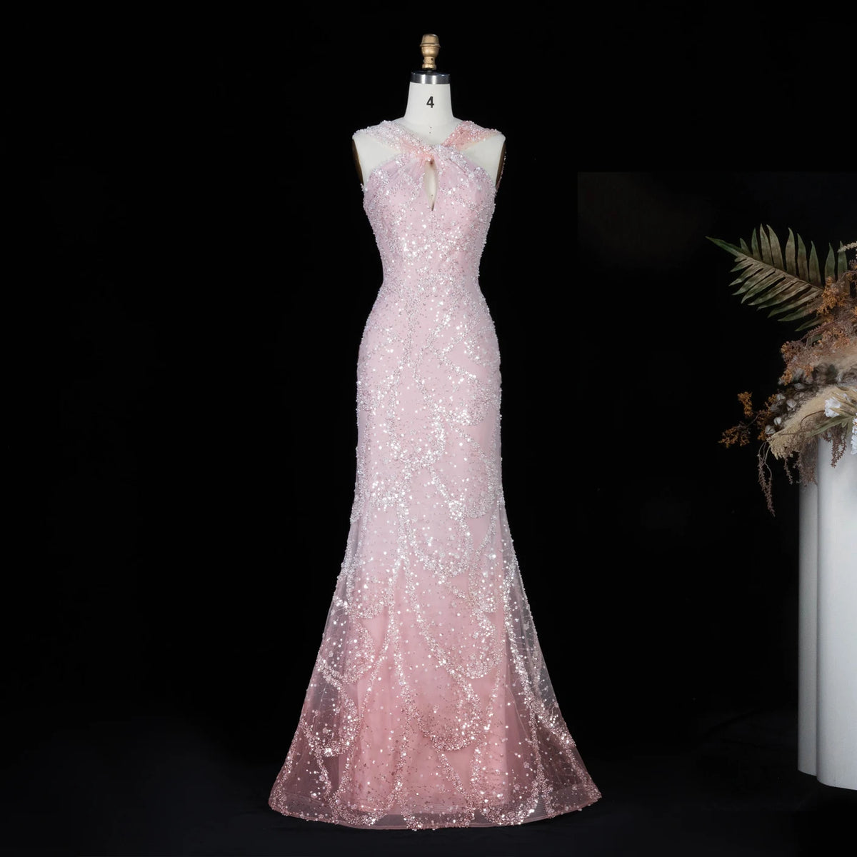 Robe de soirée trapèze perlée et croisée – CLEVI Paris