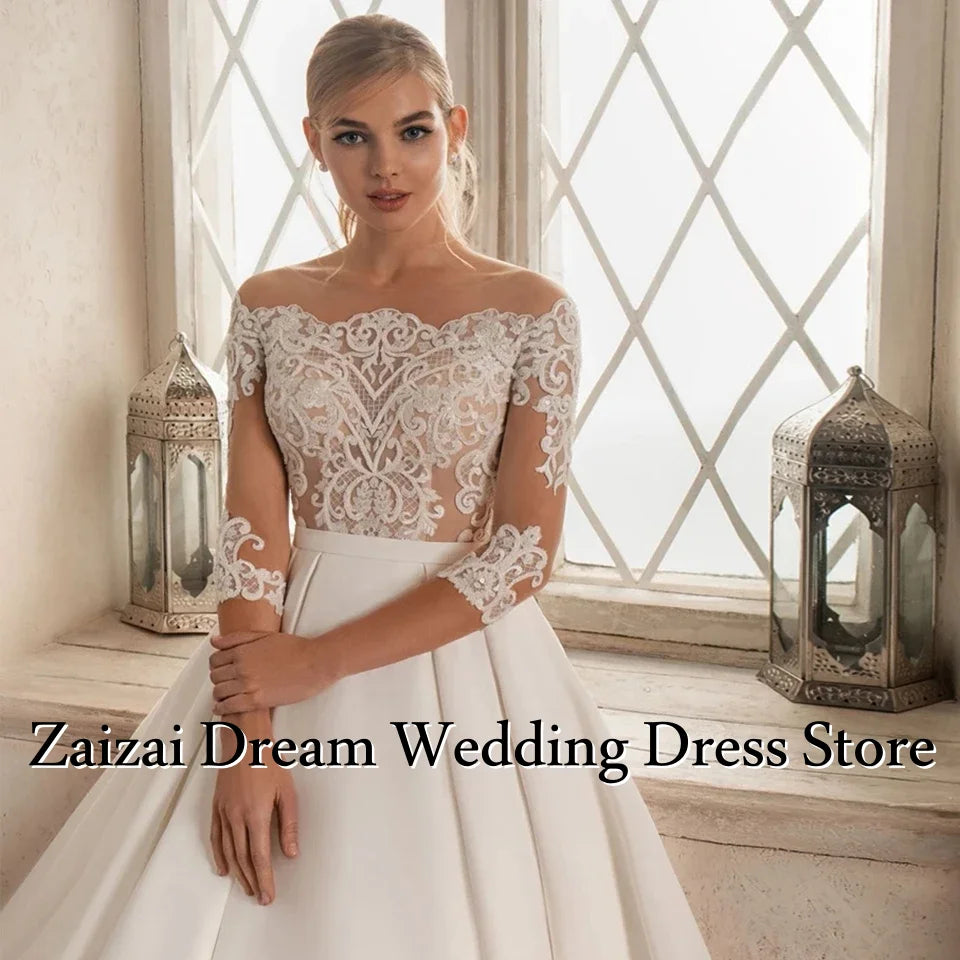 Robe de mariée satinée épaules dénudées – CLEVI Paris
