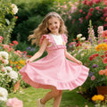 Robe fille rose à fleurs en relief – CLEVI Paris