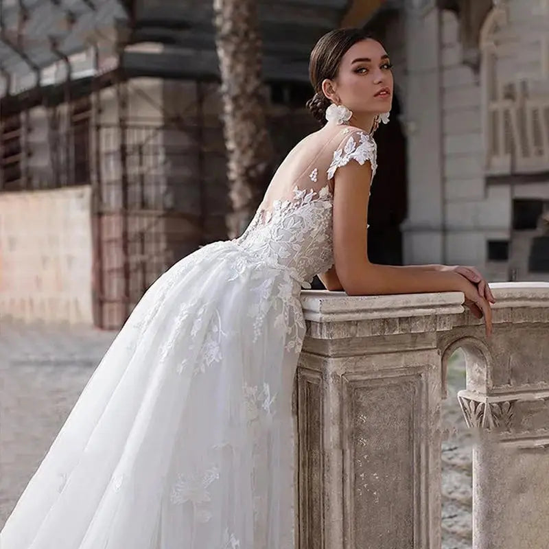 Robe de mariée trapèze manches courtes – CLEVI Paris