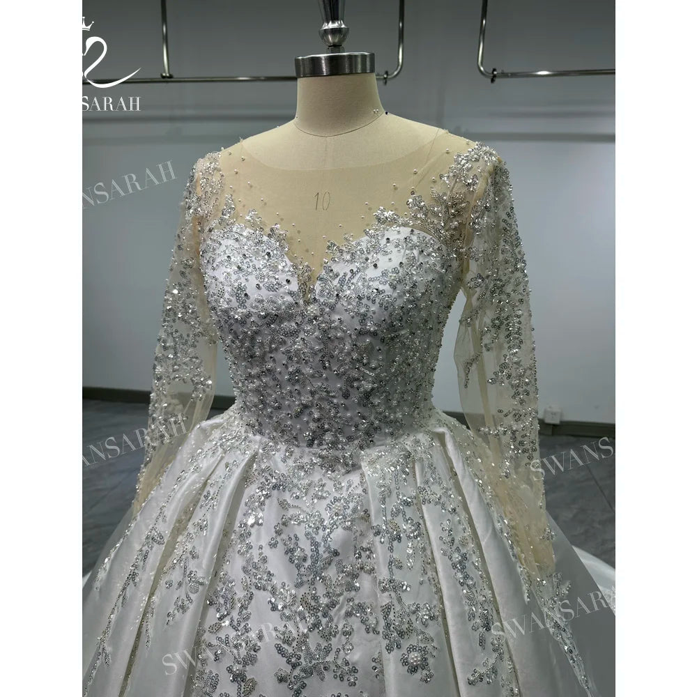 Robe de mariée princesse étagée et perlée – CLEVI Paris