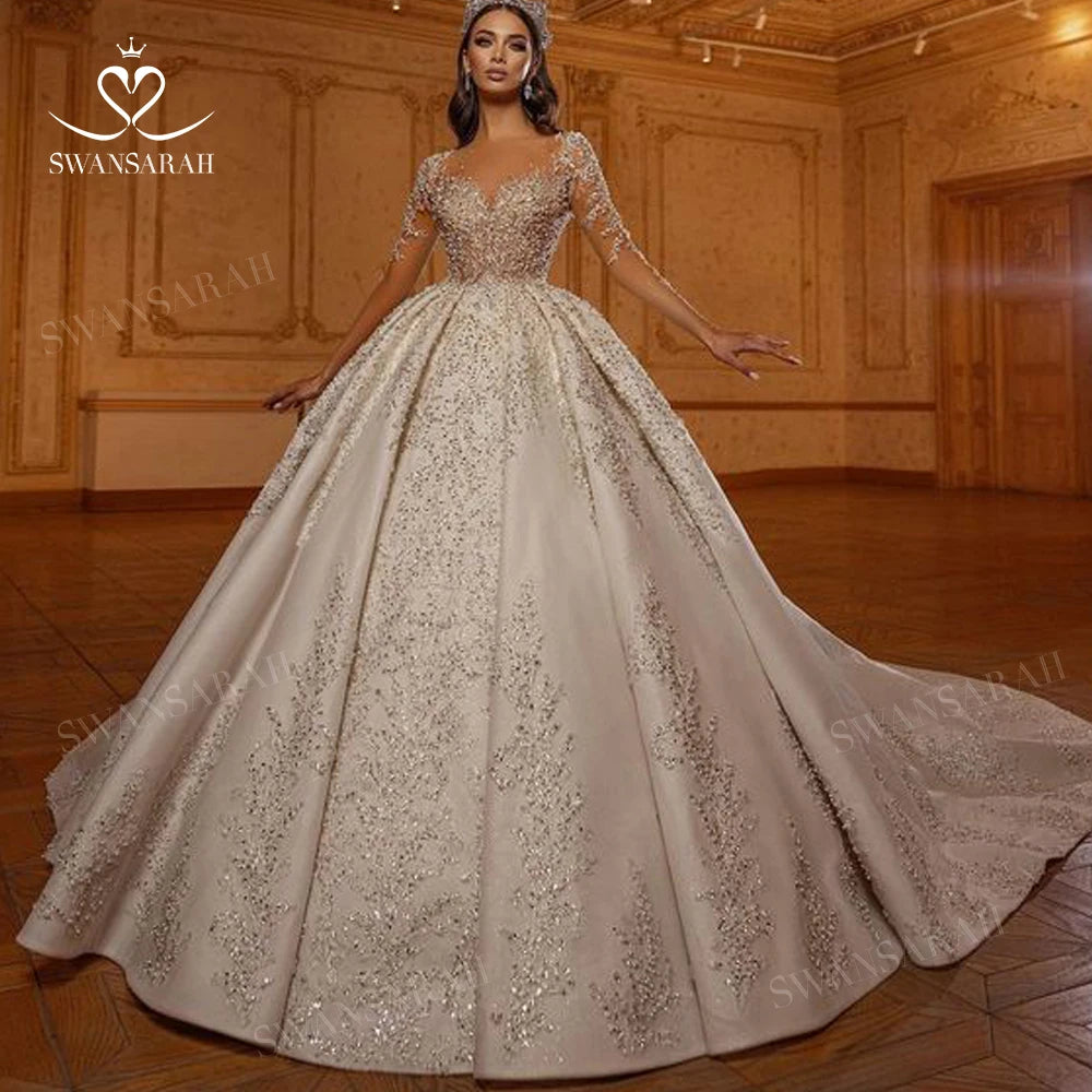Robe de mariée princesse étagée et perlée – CLEVI Paris
