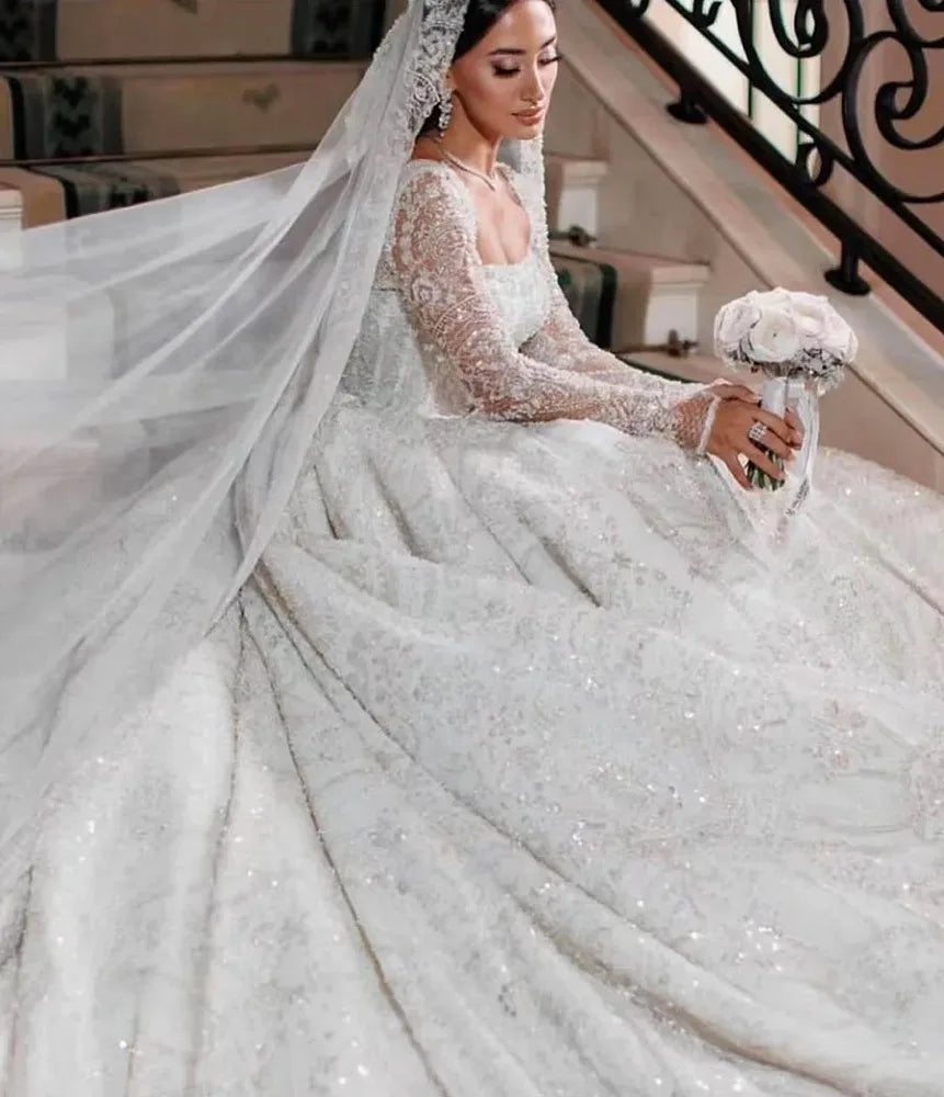 Robe de mariée princesse en tulle à dentelle – CLEVI Paris
