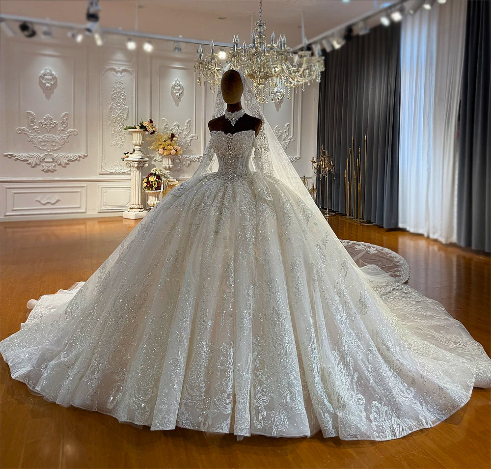 Robe de mariée fleurie col bateau – CLEVI Paris