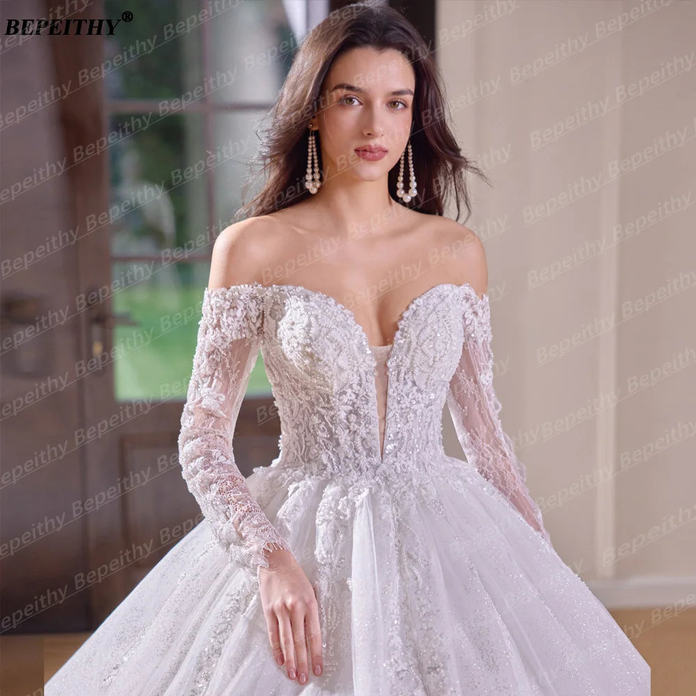 Robe de mariée épaules dénudées – CLEVI Paris