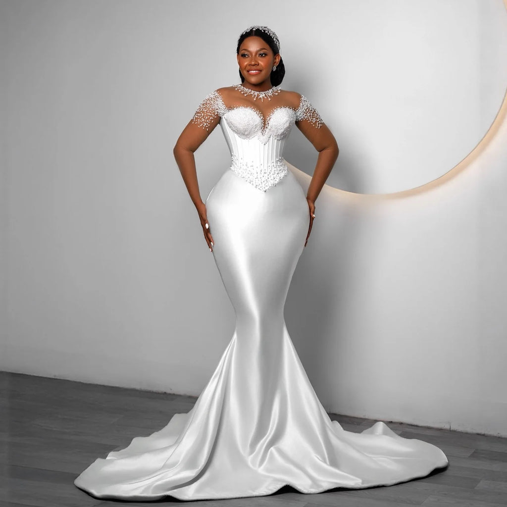 Robe de mariée sirène en satin perlé – CLEVI Paris