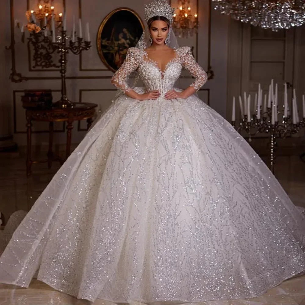 Robe de mariée en tulle col V manches longues – CLEVI Paris