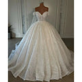 Robe de mariée trapèze à perles – CLEVI Paris
