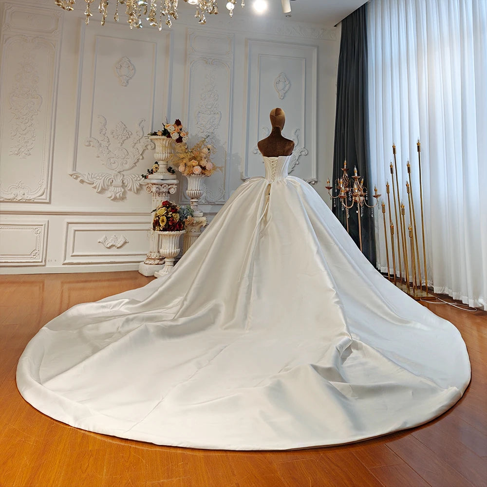 Robe de mariée fleurie en tulle – CLEVI Paris