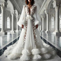Robe de mariée à manches bouffantes – CLEVI Paris
