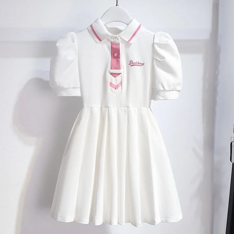 Robe fille plissée à manches bouffantes – CLEVI Paris