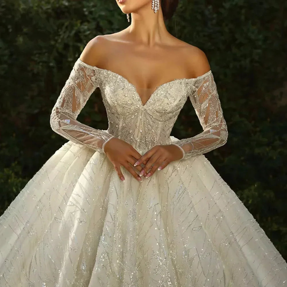 Robe de mariée épaules nues perlée – CLEVI Paris