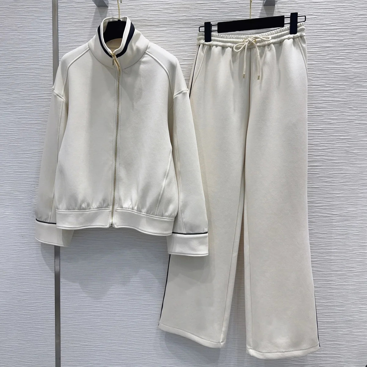 Ensemble femme veste zippée et pantalon large – CLEVI Paris