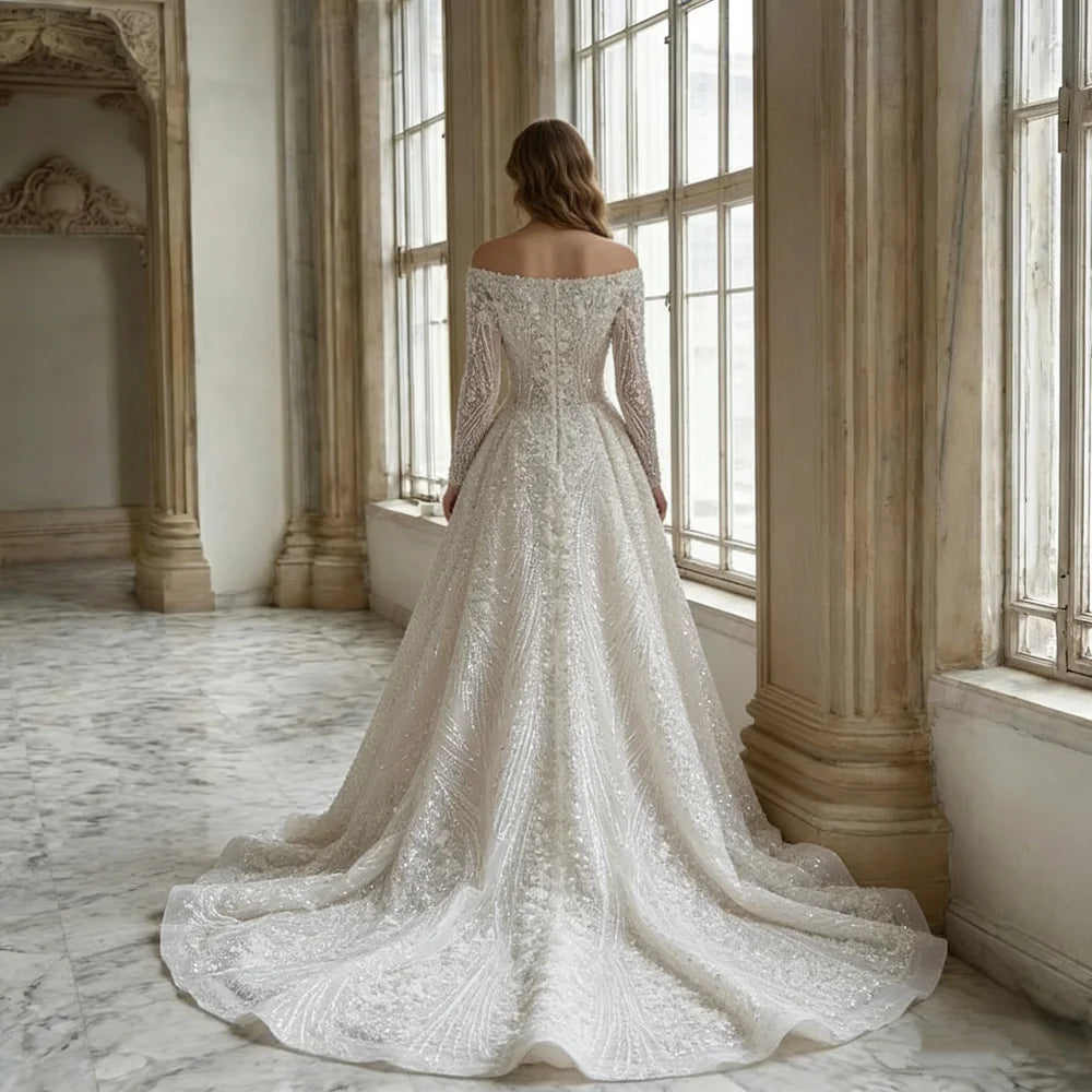 Robe de mariée trapèze en crêpe perlé – CLEVI Paris