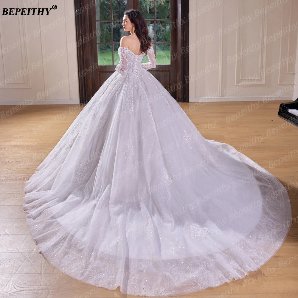 Robe de mariée épaules dénudées – CLEVI Paris