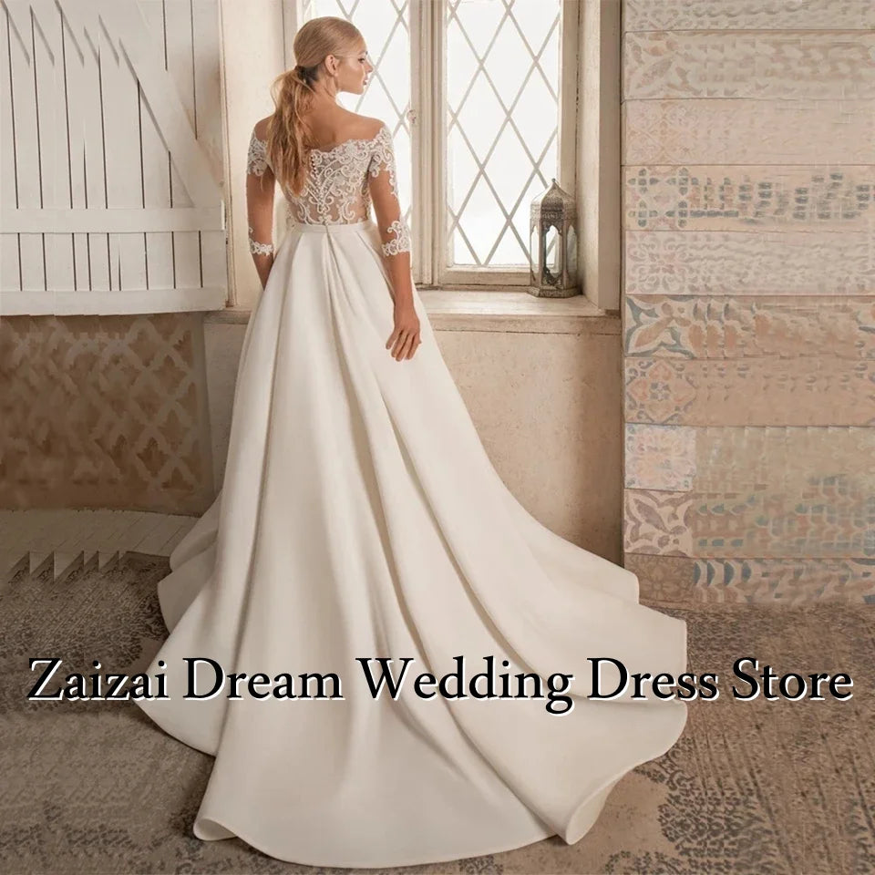 Robe de mariée satinée ligne A épaules dénudées – CLEVI Paris