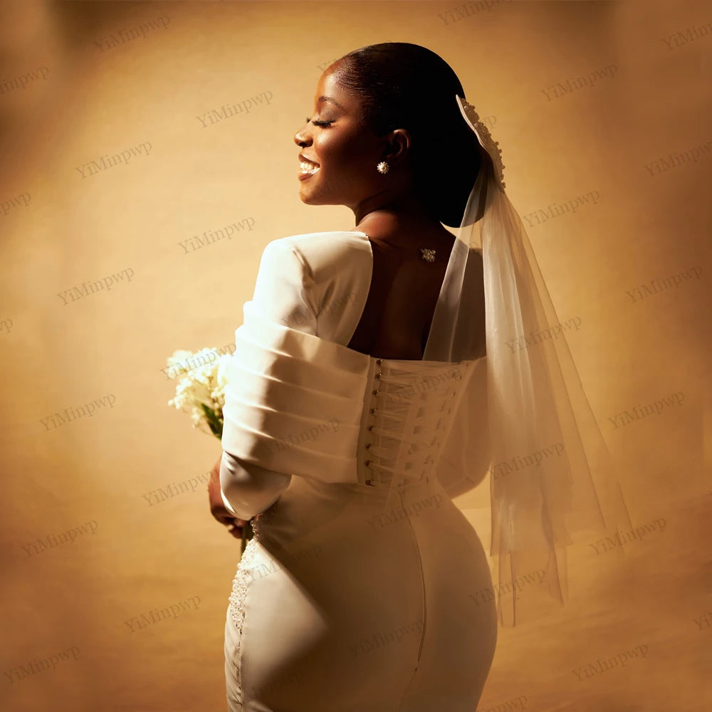 Robe de mariée civile manches longues perlée – CLEVI Paris
