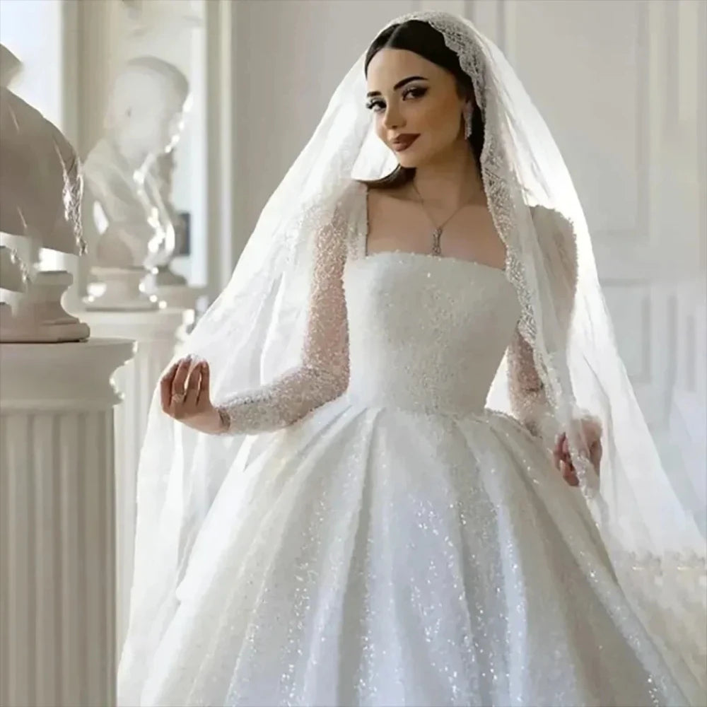 Robe de mariée trapèze perlée à dos ouvert – CLEVI Paris