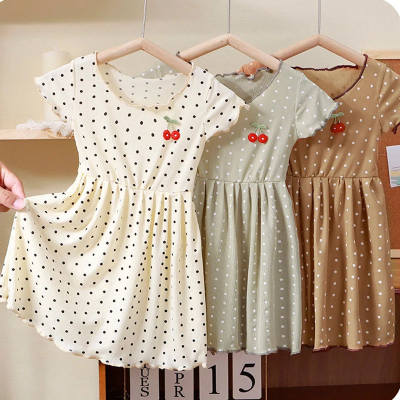 Robe fille à pois et manches courtes – CLEVI Paris