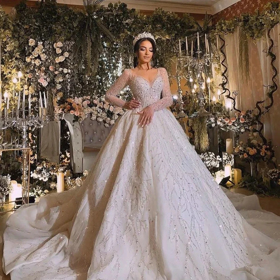 Robe de mariée princesse perlée et pailletée – CLEVI Paris