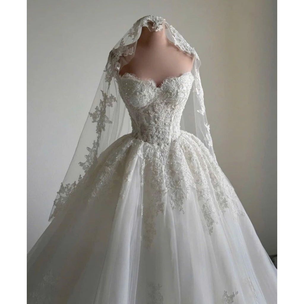 Robe de mariée tulle épaules dénudées – CLEVI Paris