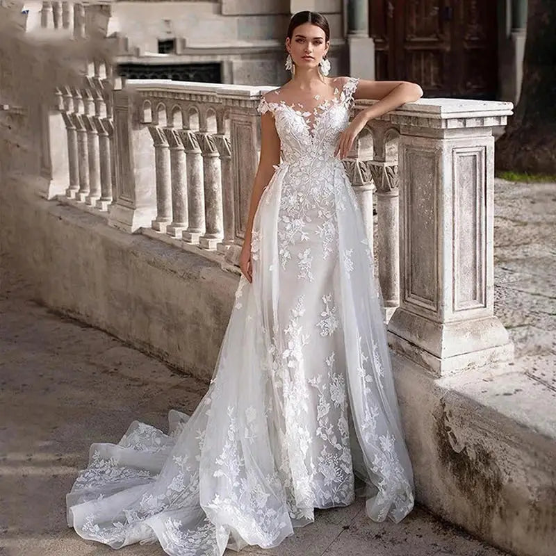 Robe de mariée trapèze manches courtes – CLEVI Paris