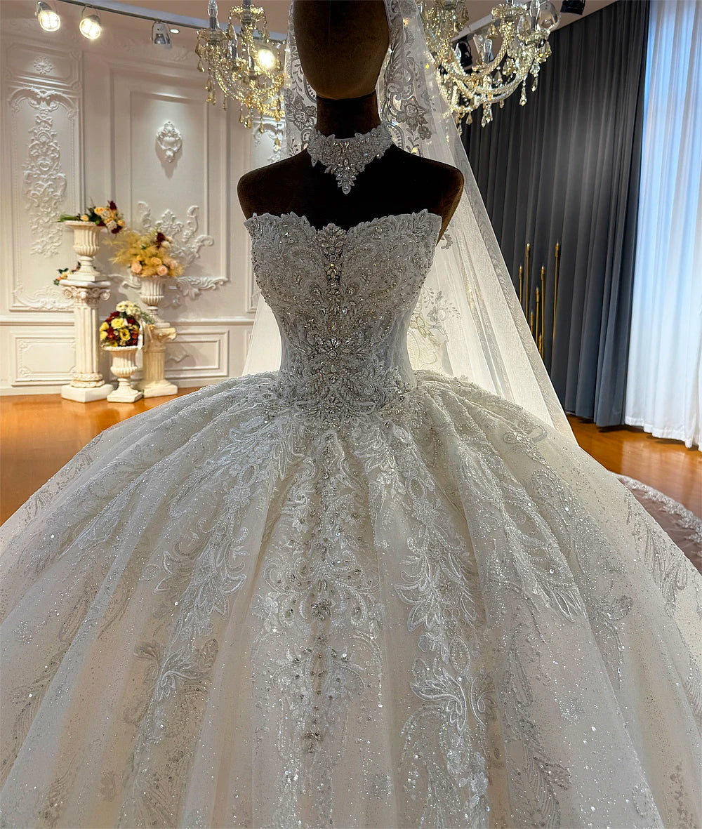 Robe de mariée fleurie col bateau – CLEVI Paris