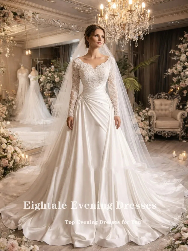 Robe de mariée perles et traîne chapelle – CLEVI Paris