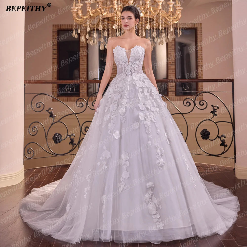 Robe de mariée bohème à fleurs – CLEVI Paris