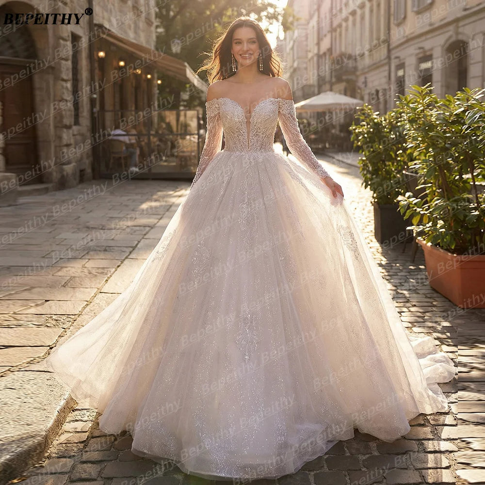Robe de mariée épaules dénudées – CLEVI Paris