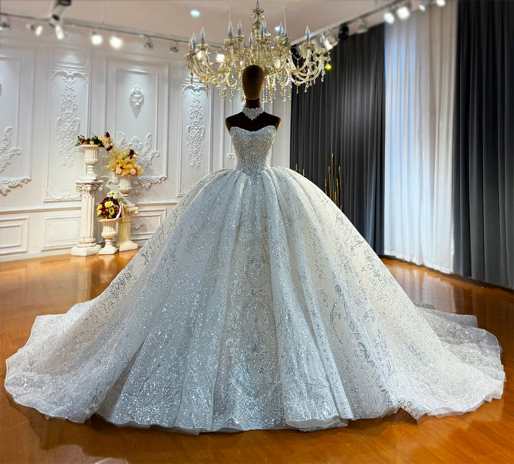 Robe de mariée en tulle à manches longues – CLEVI Paris