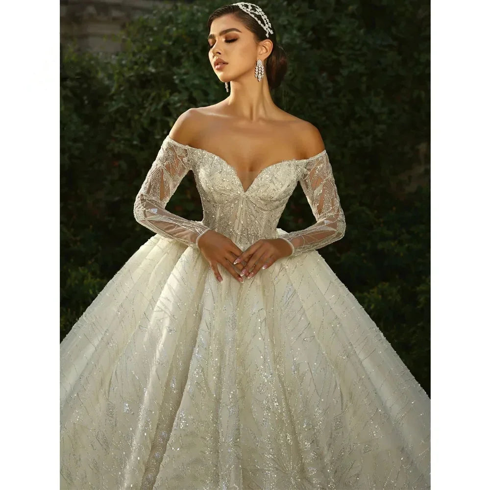Robe de mariée épaules nues perlée – CLEVI Paris