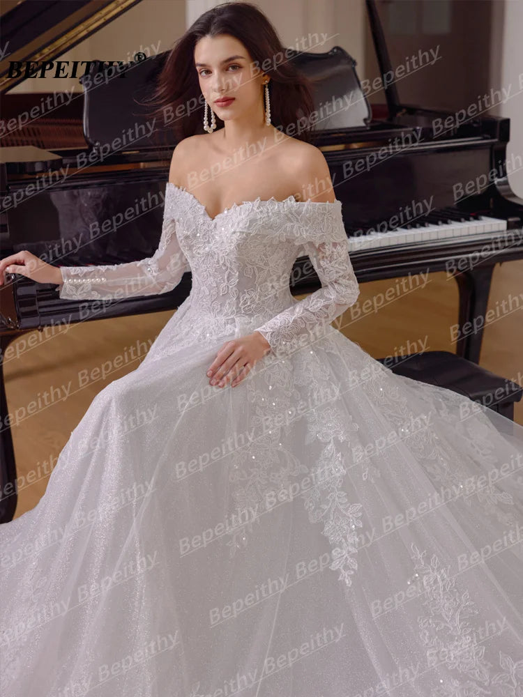 Robe de mariée ligne A en tulle et dentelle - CLEVI Paris