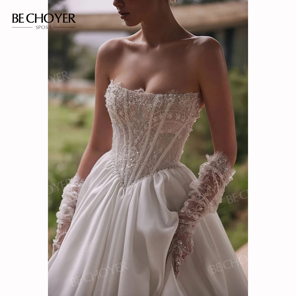 Robe de mariée ligne A sans manches en satin – CLEVI Paris