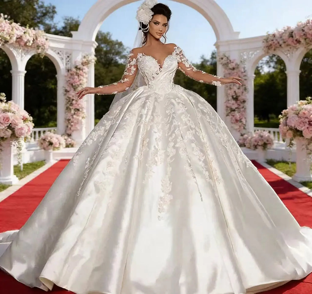 Robe de mariée princesse à manches longues – CLEVI Paris
