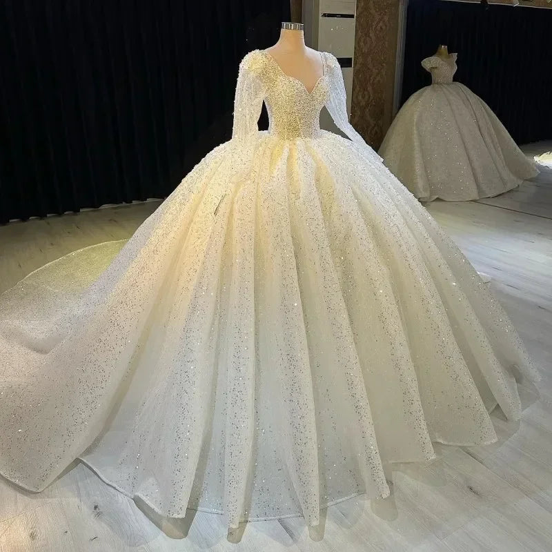 Robe de mariée princesse pailletée à col cœur – CLEVI Paris
