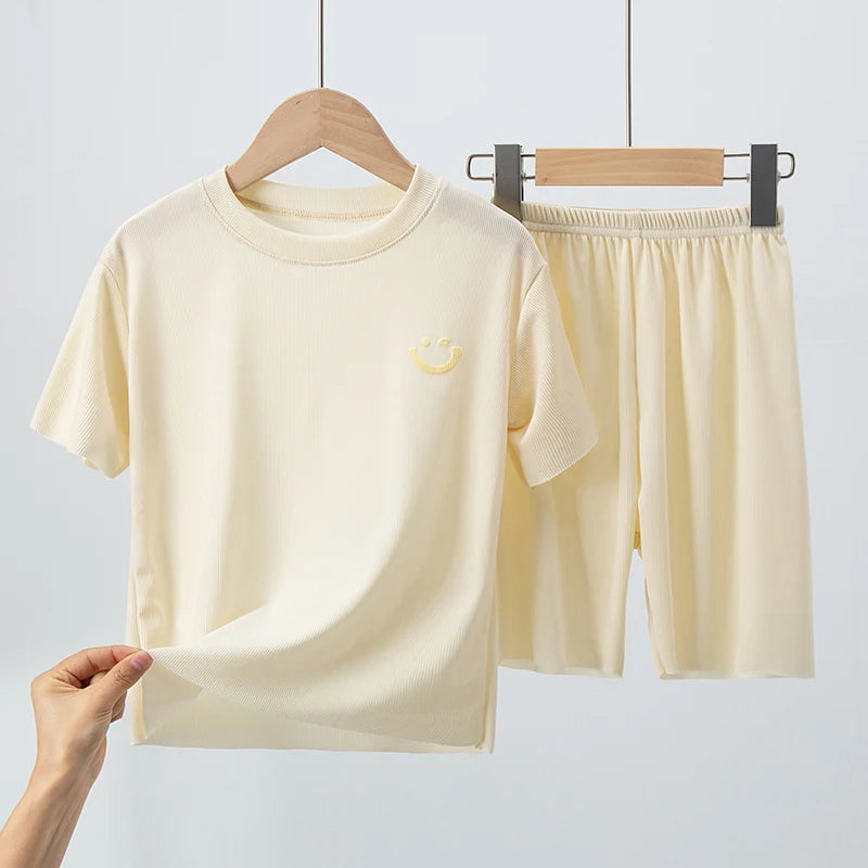 Tenue enfant d’été unie, polyester et élasthanne – CLEVI Paris