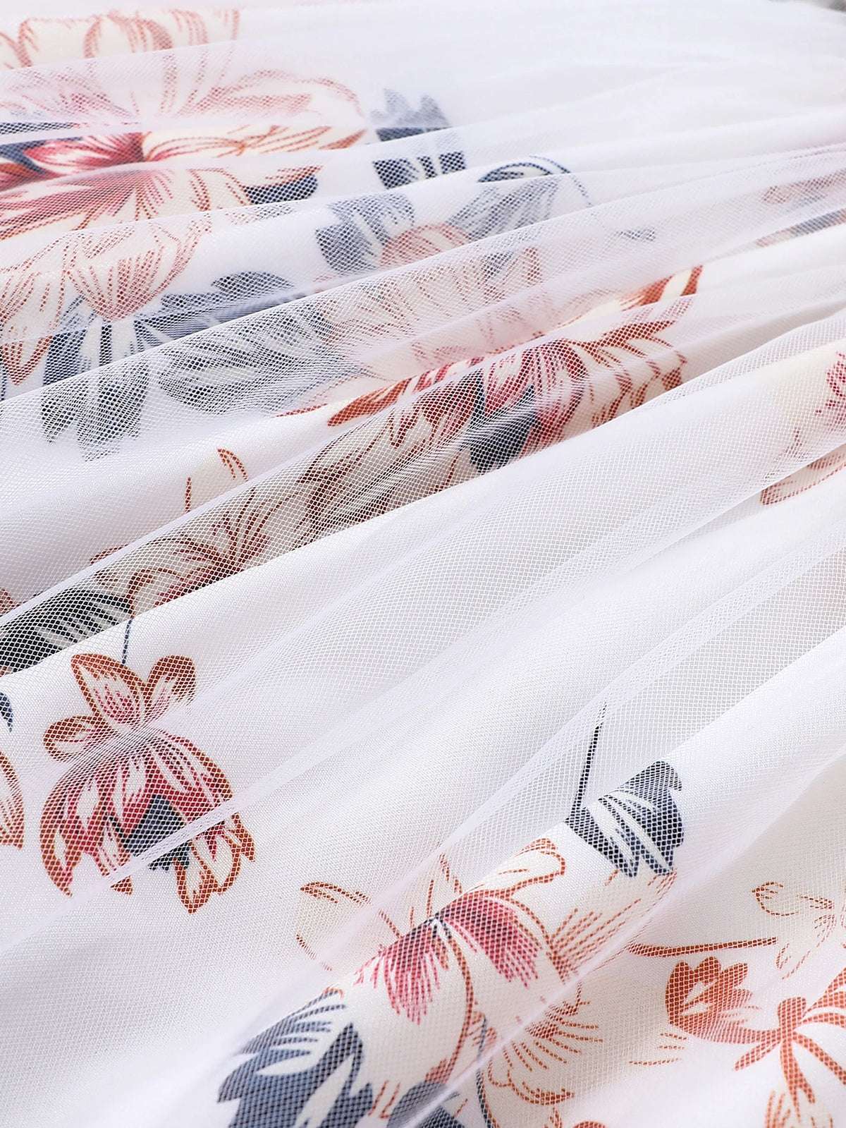 Robe fille fleurie à bretelles et ceinture – CLEVI Paris