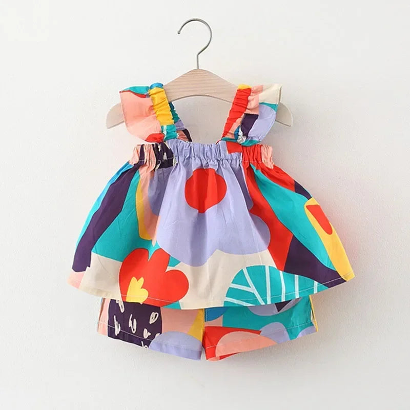 Ensemble fille haut fleuri à bretelles et pantalon – CLEVI Paris