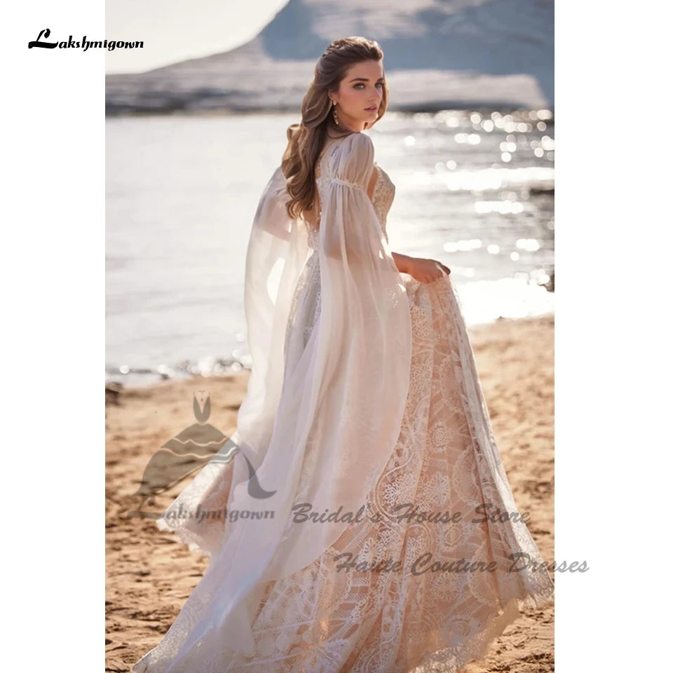Robe de mariée bohème en tulle, dentelle et col V - CLEVI Paris
