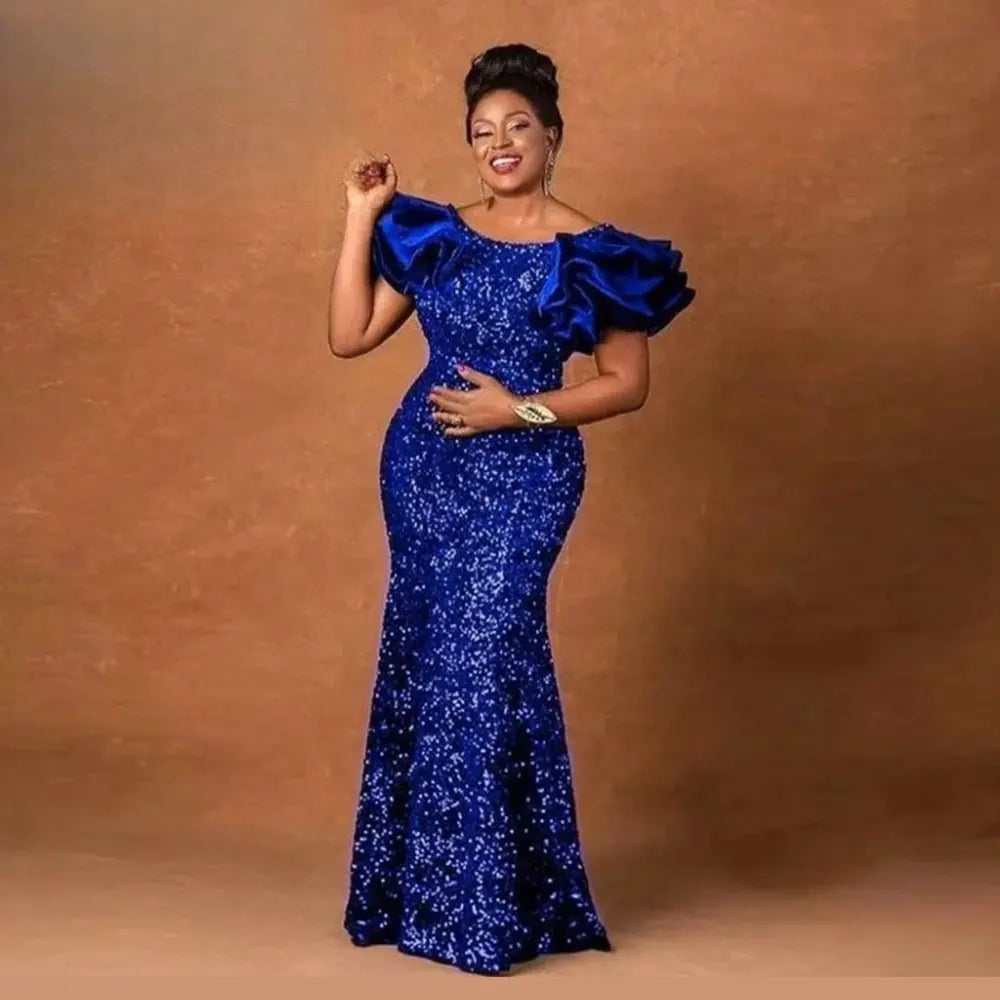Robe sirène à paillettes et perles – CLEVI Paris