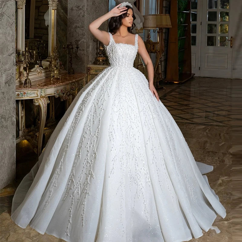 Robe de mariée princesse en organza perlé – CLEVI Paris