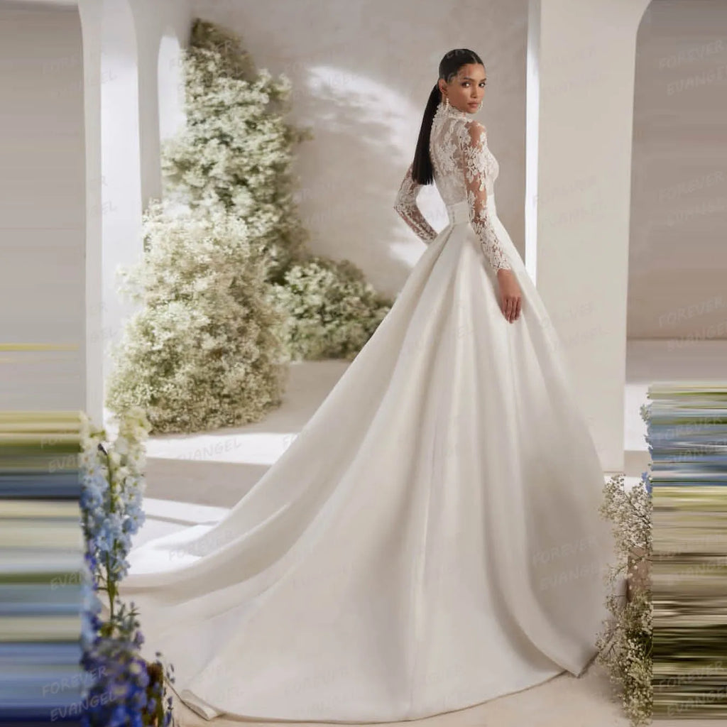 Robe de mariée bohème en tulle à manches longues – CLEVI Paris