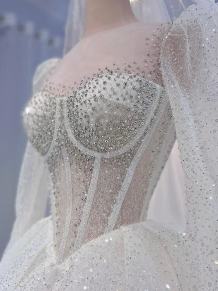 Robe de mariée en tulle perlée – CLEVI Paris