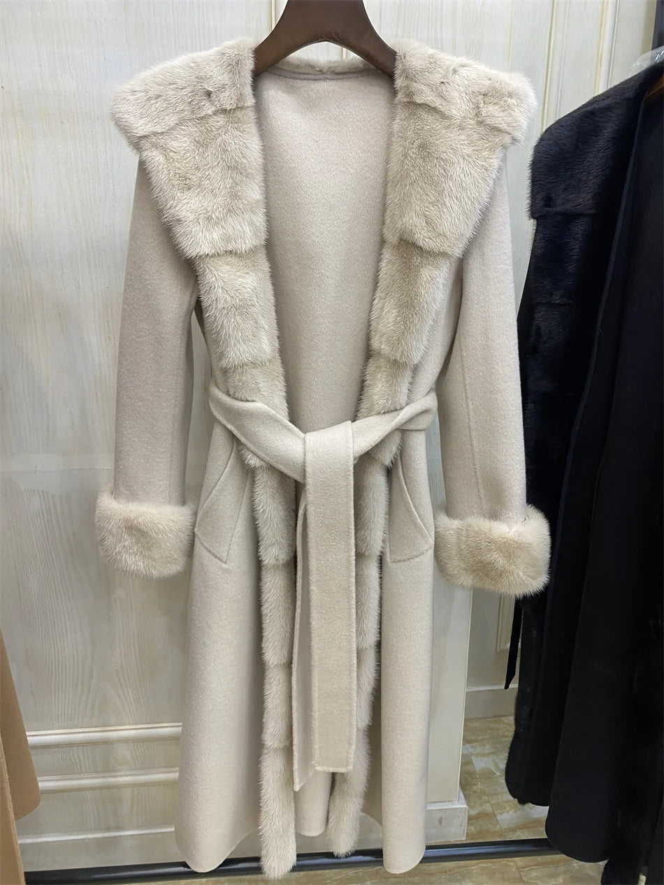 Manteau long femme à capuche et ceinture – CLEVI Paris