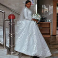Robe de mariée en dentelle robe de bal à col rond – CLEVI Paris