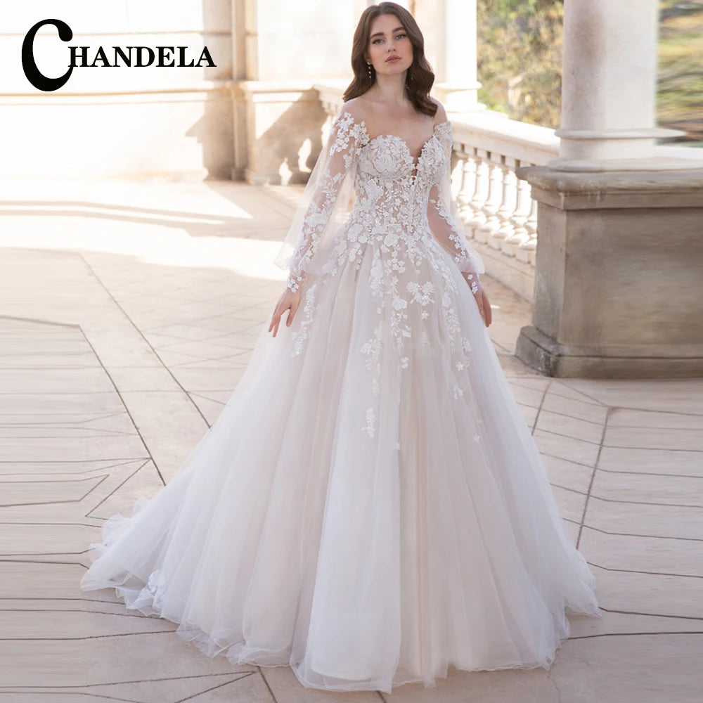 Robe de mariée trapèze manches bouffantes – CLEVI Paris