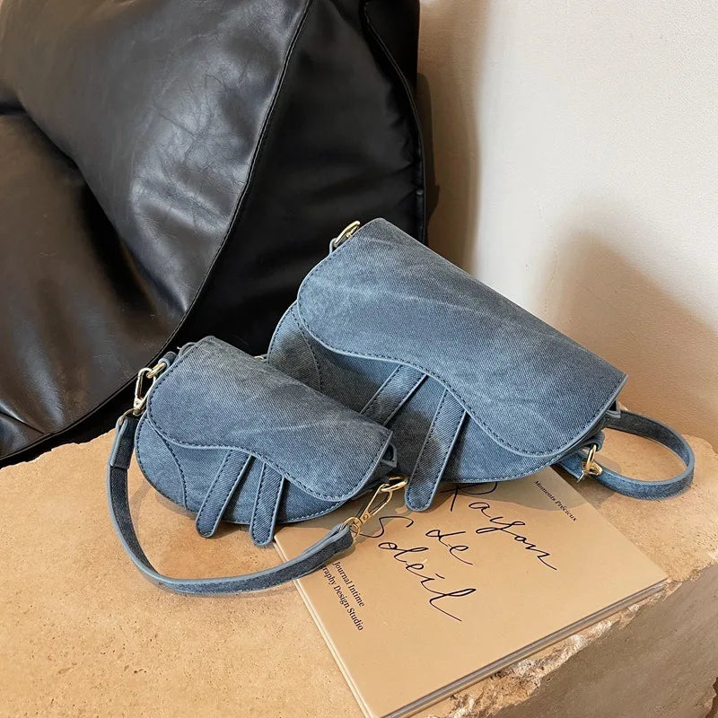 Sac bandoulière femme forme selle – CLEVI Paris