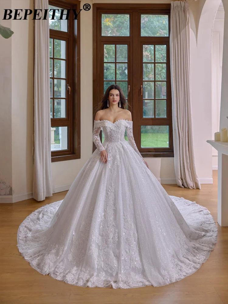 Robe de mariée ligne A en tulle et dentelle - CLEVI Paris